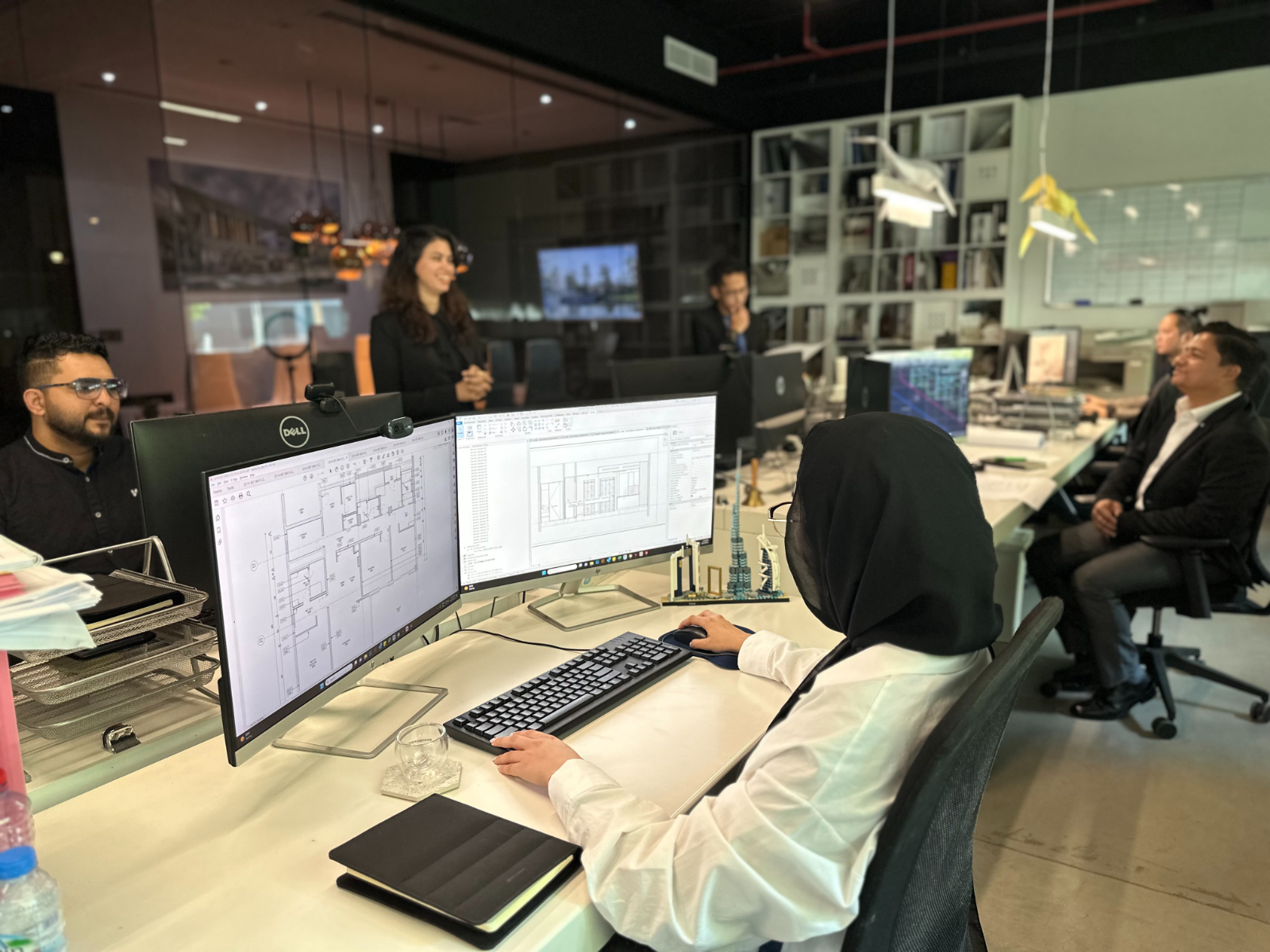 Settle Dubai Team of Architects & Interior Designers at Workplace in Dubai Media City.
